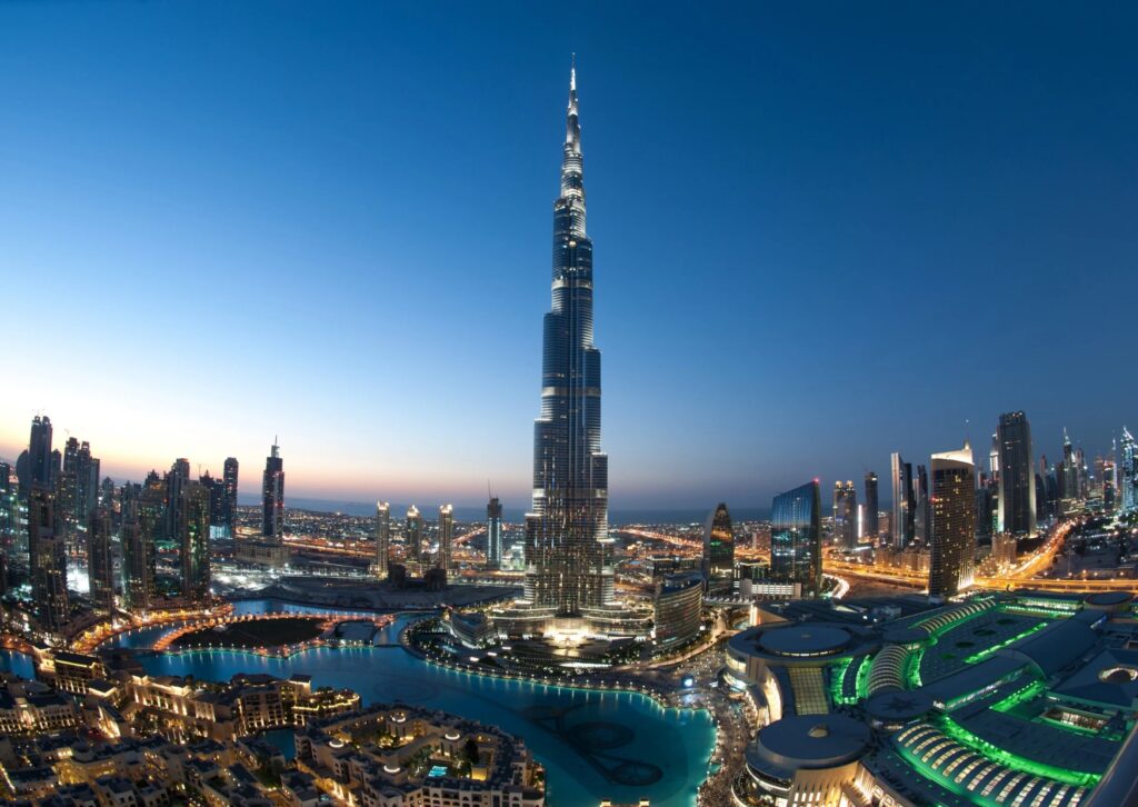 The Burj Khalifa, the world's tallest building, towers majestically against a clear blue sky.