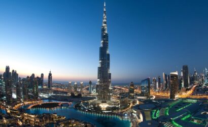 The Burj Khalifa, the world's tallest building, towers majestically against a clear blue sky.