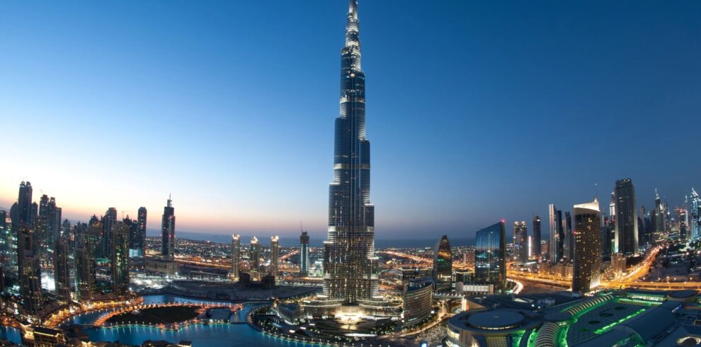 The Burj Khalifa, the world's tallest building, towers majestically against a clear blue sky.