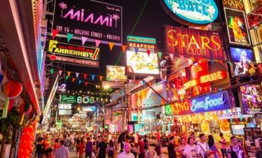Walking Street Pattaya nightlife with neon signs