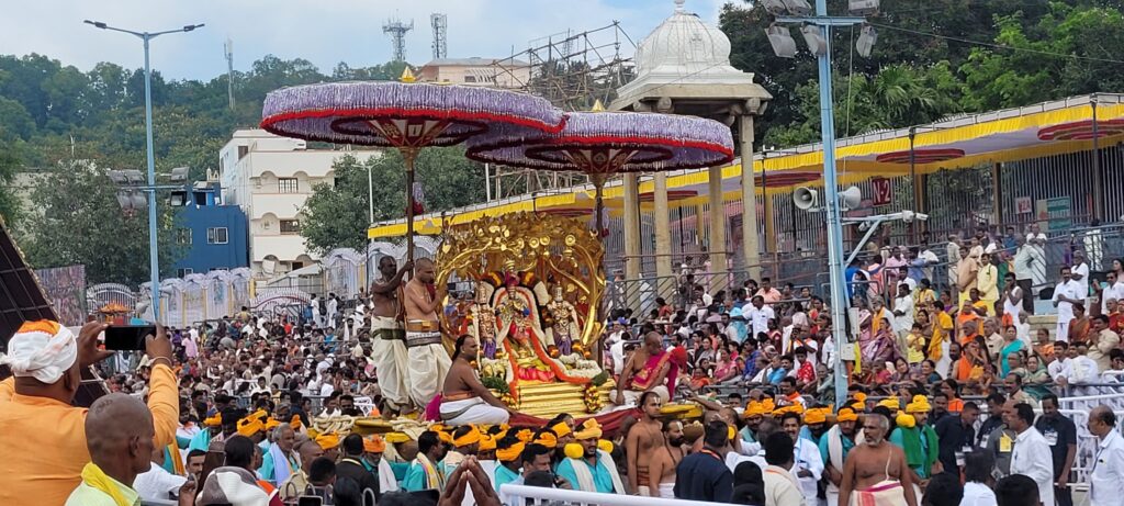 A large crowd gathers for the Tirumala Tirupati Brahmotsavam festival, celebrating Swami Venkateswara.