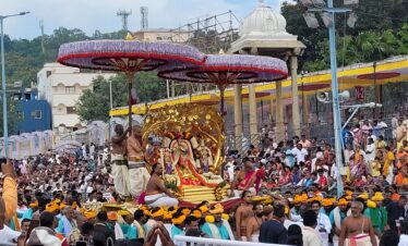 A large crowd gathers for the Tirumala Tirupati Brahmotsavam festival, celebrating Swami Venkateswara.
